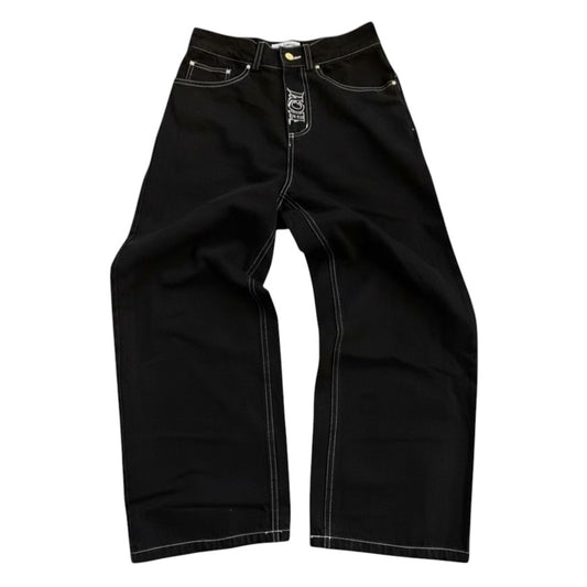 SWAGTOK men's black denim jeans with white contrast stitching and zipper fly, retro casual style.