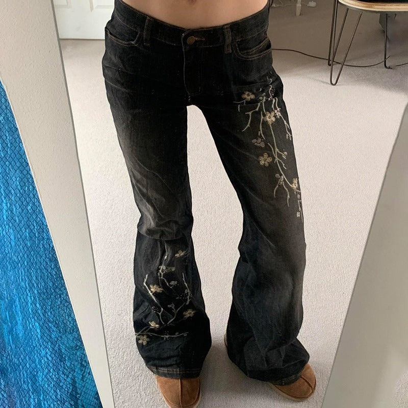 Jeansy bootcut flowers