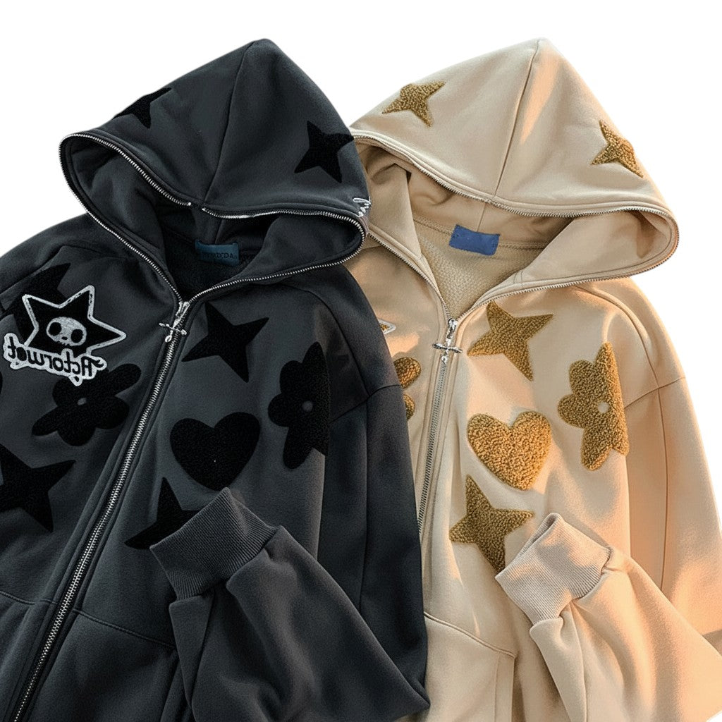 SWAGTOK apricot and dark grey zip-up hoodies with embroidered stars, hearts, and flowers. Loose fit, hooded.