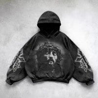 SWAGTOK black cotton hoodie with hand-painted Jesus graphic and distressed sleeves, Y2K street style.