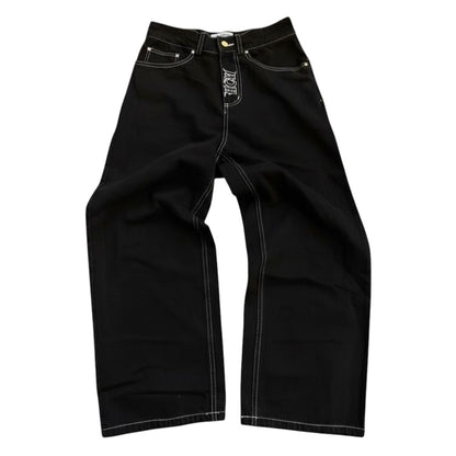 SWAGTOK men's black denim jeans with white contrast stitching and zipper fly, retro casual style.