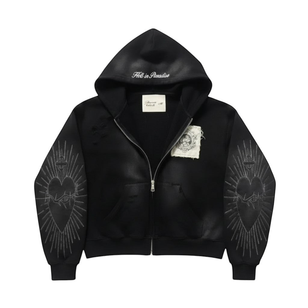 SWAGTOK black zip-up hoodie with embroidered heart and sunburst design on sleeves,