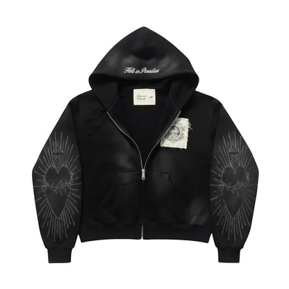 SWAGTOK black zip-up hoodie with embroidered heart and sunburst design on sleeves,