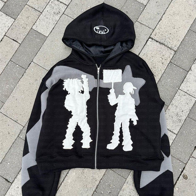 SWAGTOK black polyester zip-up hoodie with graphic print of two figures and stars on sleeves. Long sleeve, hooded.