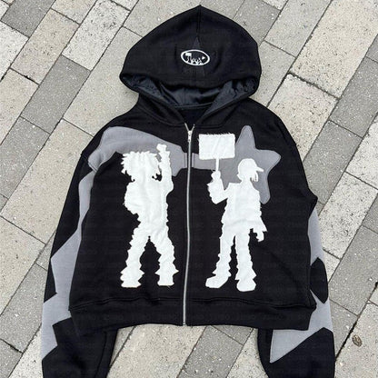 SWAGTOK black polyester zip-up hoodie with graphic print of two figures and stars on sleeves. Long sleeve, hooded.