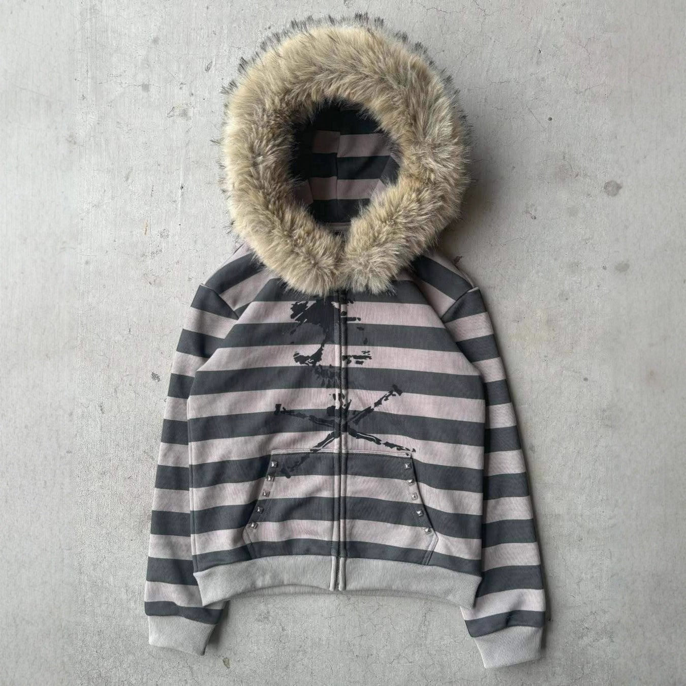 SWAGTOK black and grey striped fleece hoodie with faux fur trim, zipper, and graphic print.