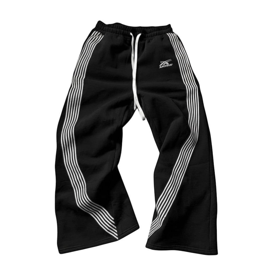SWAGTOK black fleece-lined sports pants with embroidered white stripes and drawstring waist.