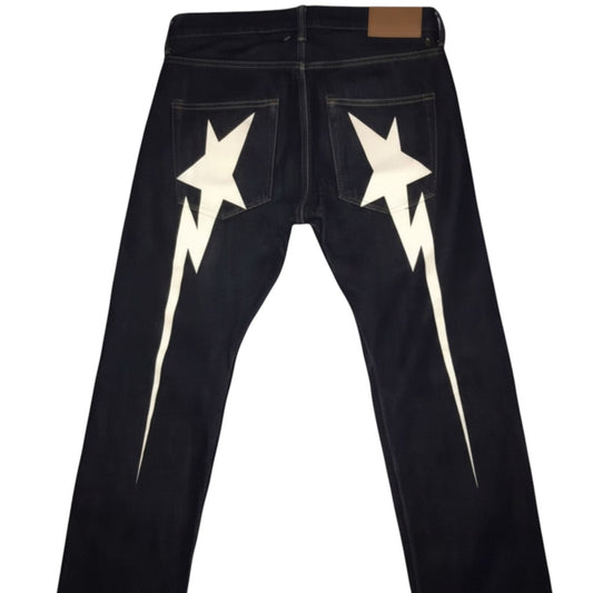 SWAGTOK men's black wide leg jeans with white lightning bolt star graphic on back pockets.