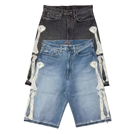 SWAGTOK blue denim shorts with embroidered bone graphic detail and frayed hem. Hip hop style.
