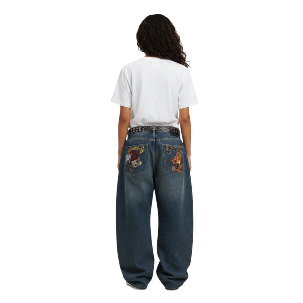 SWAGTOK blue denim wide leg jeans with embroidered tiger and dragon graphics on back pockets. Leisure style.