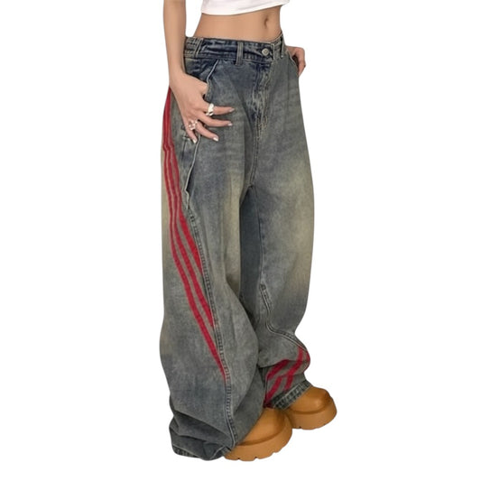 SWAGTOK blue denim baggy jeans with red side stripes, mid-waist, straight-leg style for daily wear.