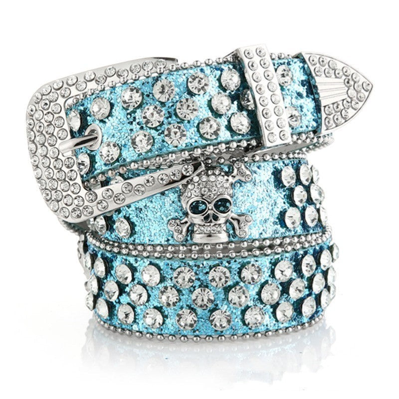 SWAGTOK Women's blue imitation leather belt with skull rhinestone buckle and crystal embellishments.