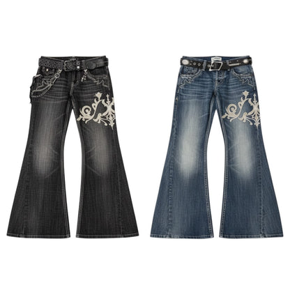SWAGTOK black and blue cotton bootcut jeans with low waist, embroidery detail, and chain accents.
