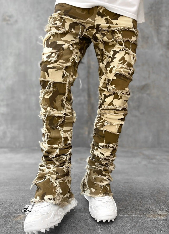 SWAGTOK men's camouflage stacked jeans with ripped details and frayed edges, made of cotton.