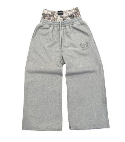 SWAGTOK gray cotton loose-fit trousers with embroidered logo and camouflage double waist detail.