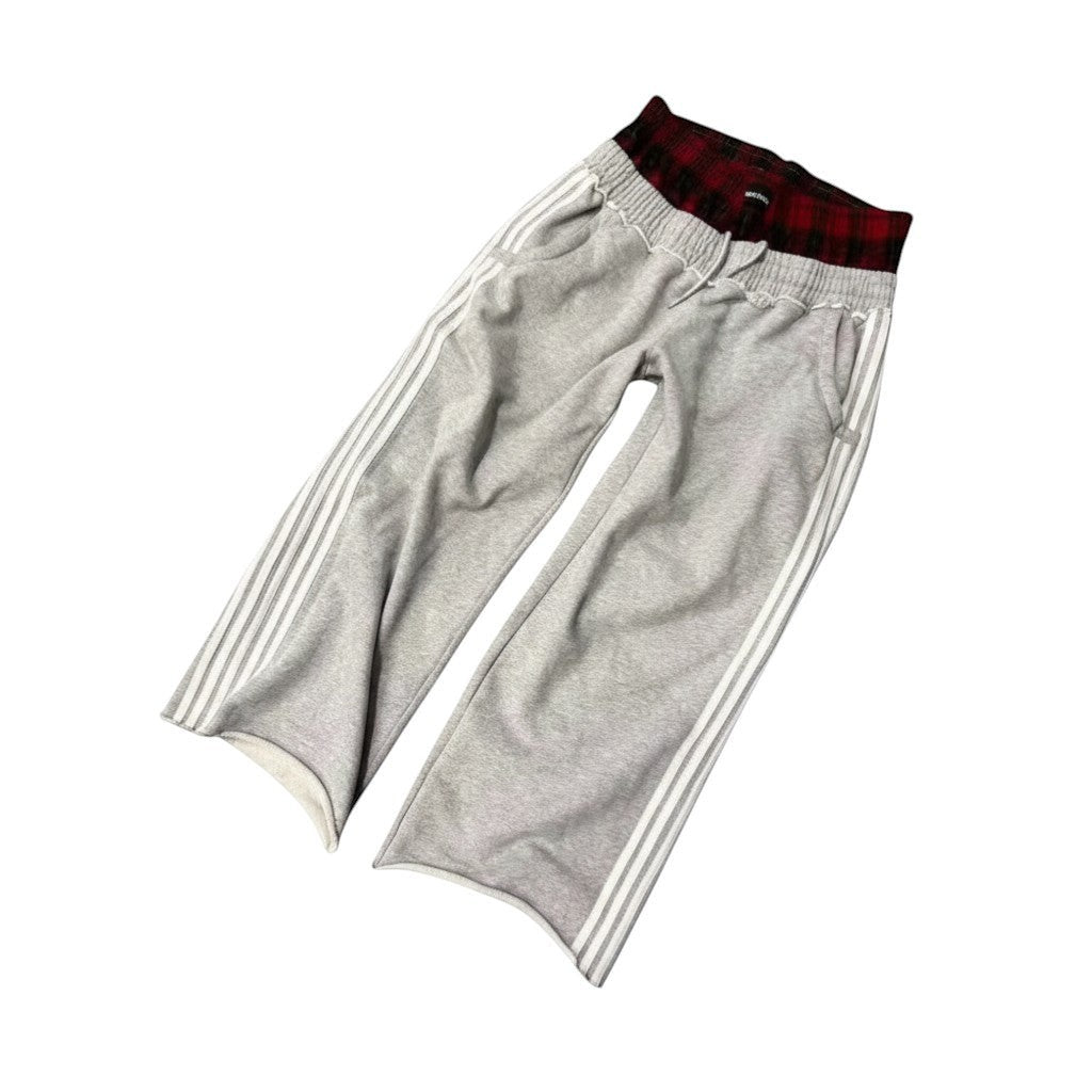 SWAGTOK gray cotton blend casual sports pants with white side stripes and plaid waistband.
