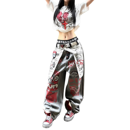 SWAGTOK gray washed denim jeans with a relaxed fit, high waist, and punk-inspired graphic details. Straight-leg cut.