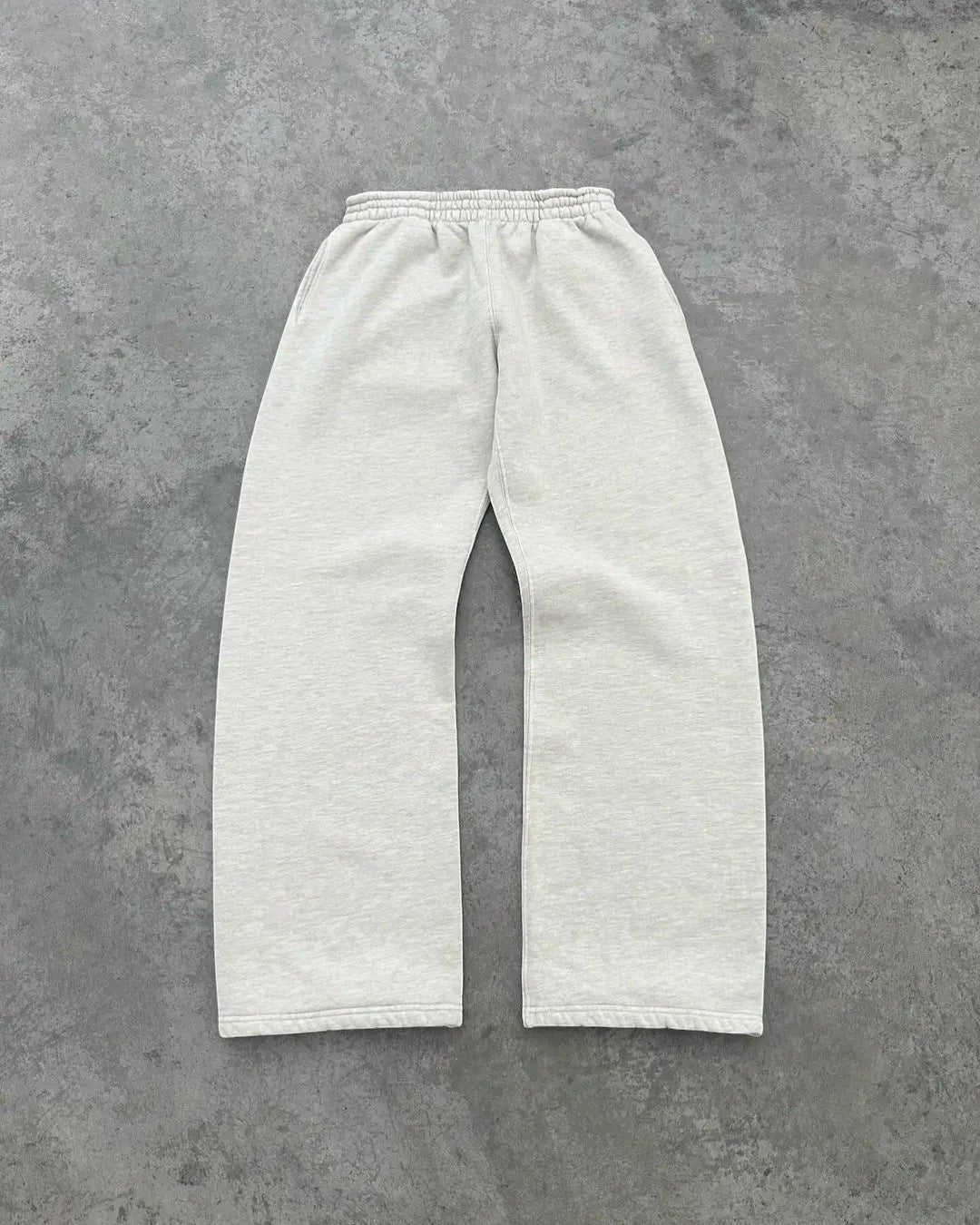 SWAGTOK light grey 100% cotton loose fit sweatpants with elastic waistband and pockets.