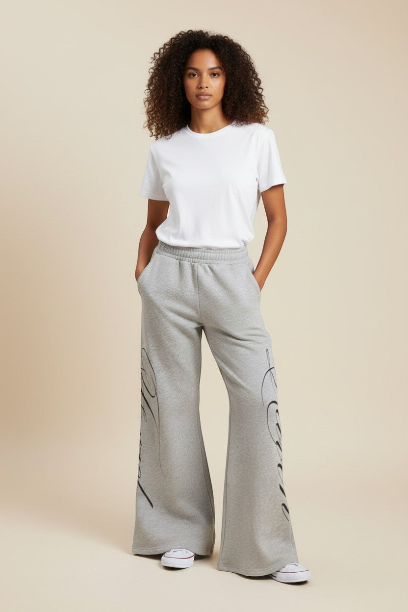 SWAGTOK grey polyester straight-leg casual pants with drawstring closure and graphic print.