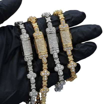 SWAGTOK gold and silver 10mm hip hop cross and star zircon bracelet with geometric links.