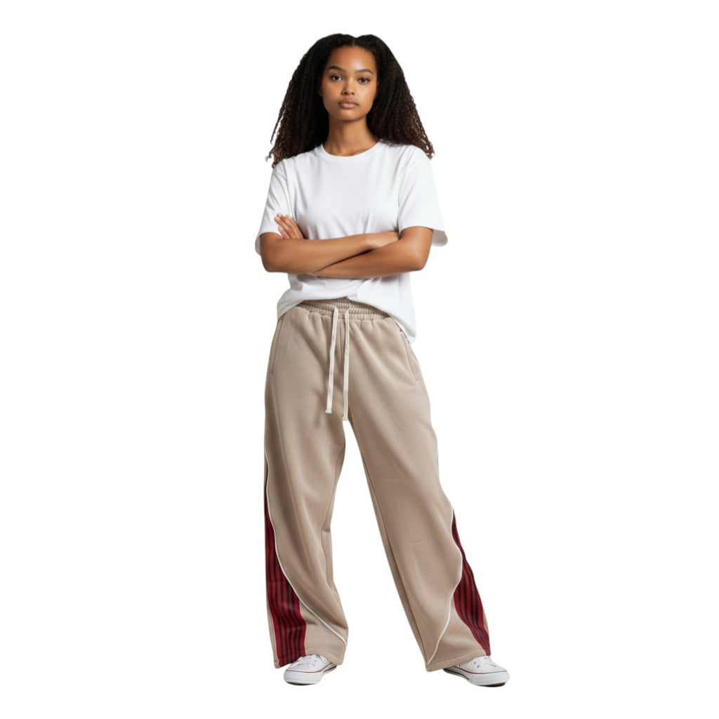 SWAGTOK khaki polyester loose fit pants with black and red striped side panels and white drawstring.