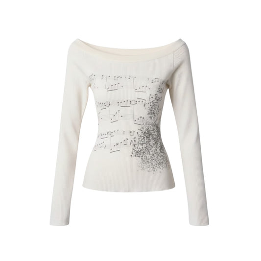 SWAGTOK women's milky white cotton long-sleeved t-shirt with a printed musical score design and off-the-shoulder neckline.