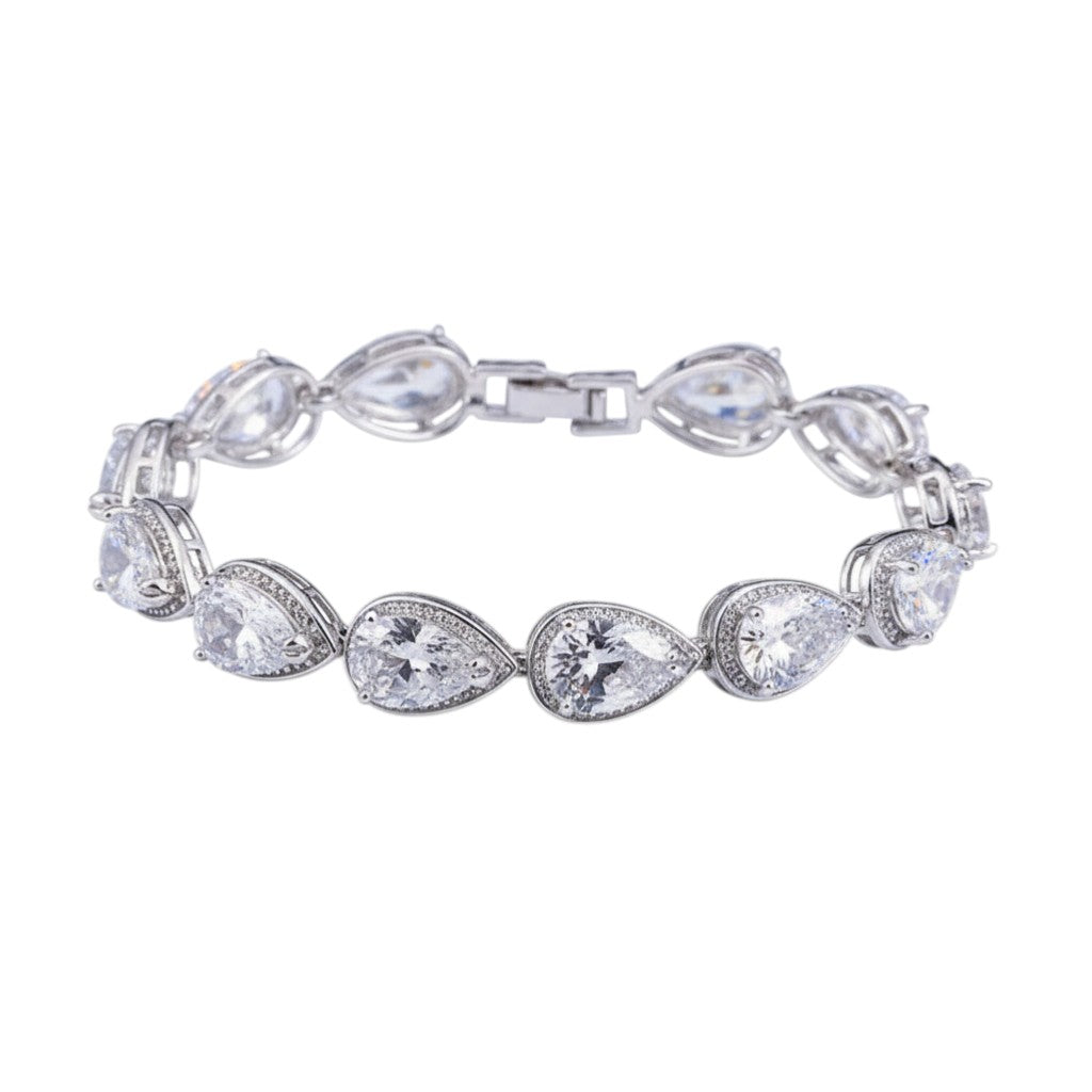 SWAGTOK platinum plated bracelet with drop-shaped white zircon stones and geometric design.