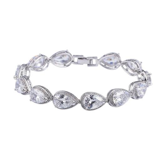 SWAGTOK platinum plated bracelet with drop-shaped white zircon stones and geometric design.