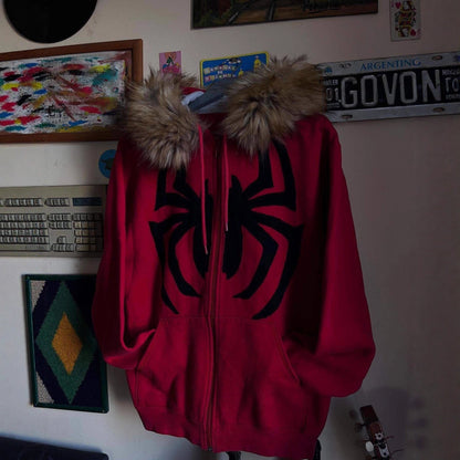 SWAGTOK red fleece hooded sweatshirt with black spider graphic and faux fur trim. Zipper front, long sleeves, street style.