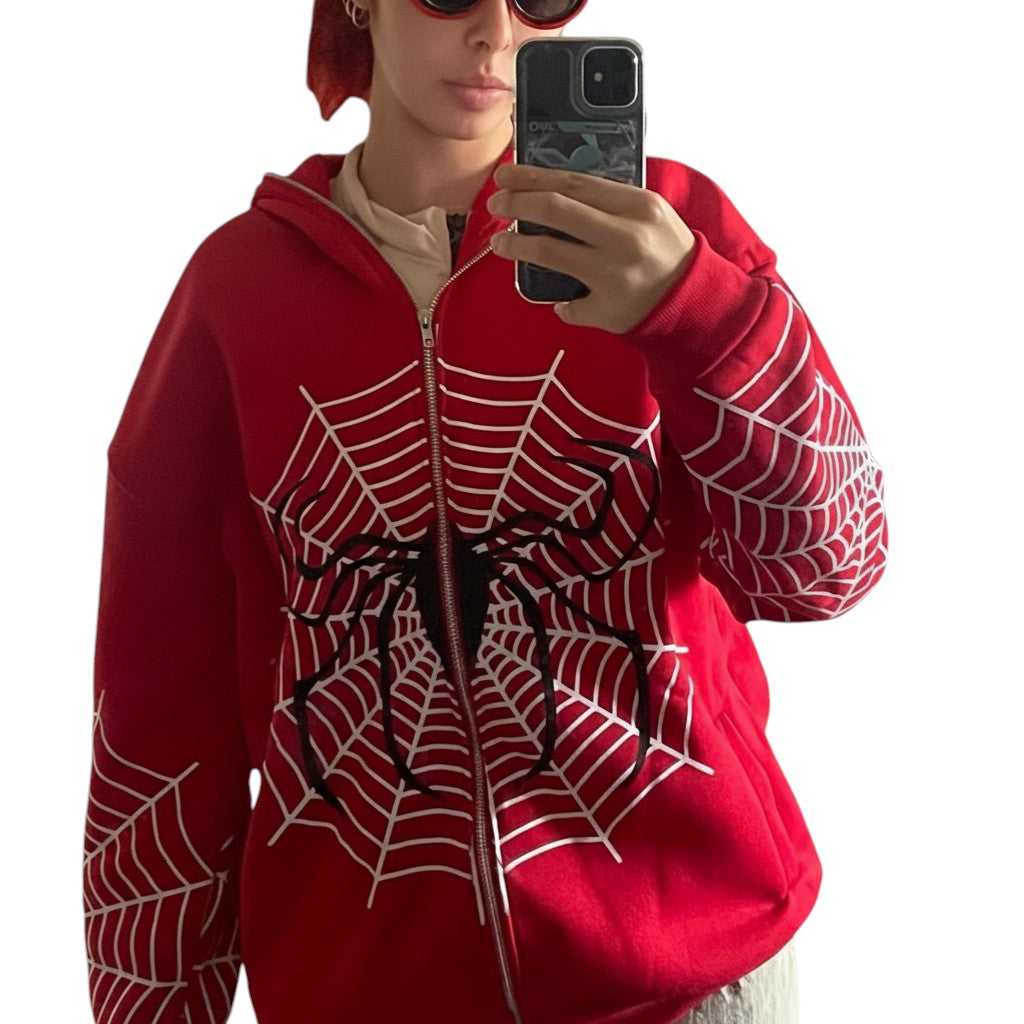 SWAGTOK red polyester zip-up hoodie with white spider web graphic and black spider detail on front and sleeves.