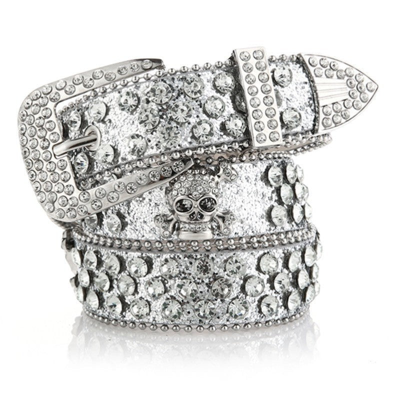 SWAGTOK Women's silver rhinestone cowboy belt with skull buckle and pin fastening. Made of imitation leather.