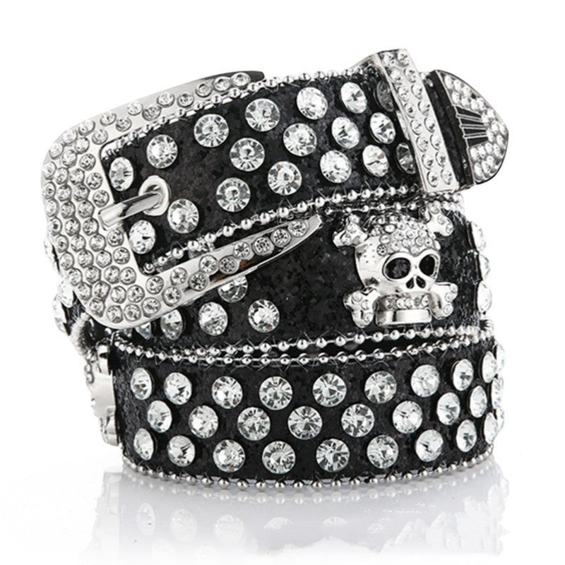 SWAGTOK black imitation leather belt with skull and rhinestones, pin buckle fastening.
